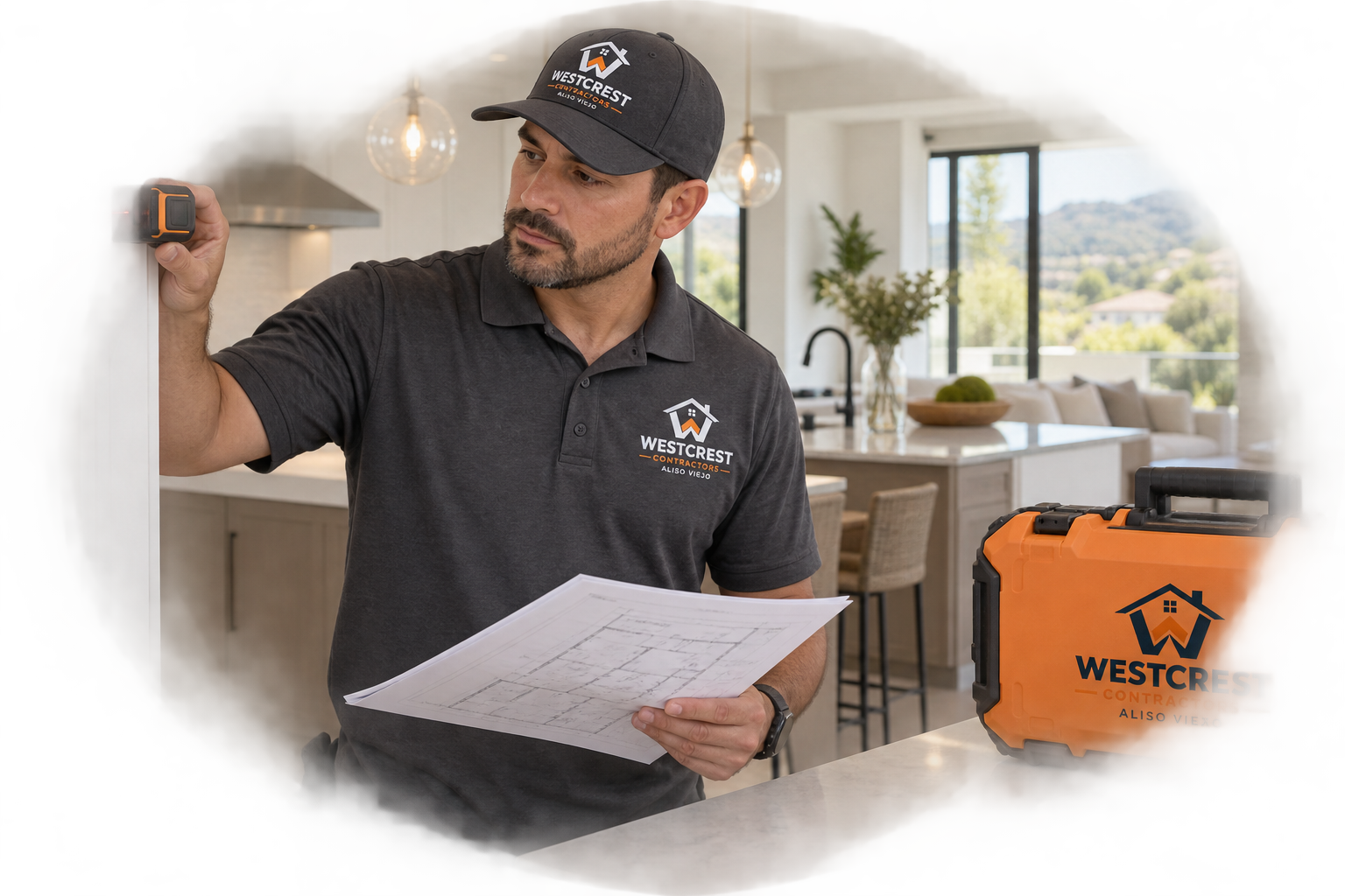 Westcrest residential general contractor with branded shirt, hat and equipment performing a quality-control walkthrough in an Aliso Viejo home